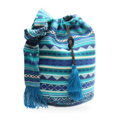 Blue woven tassel bucket bag with crossbody strap, handmade in Otavalo, Ecuador