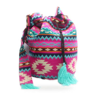 Pink woven tassel bucket bag with crossbody strap, handmade in Otavalo, Ecuador