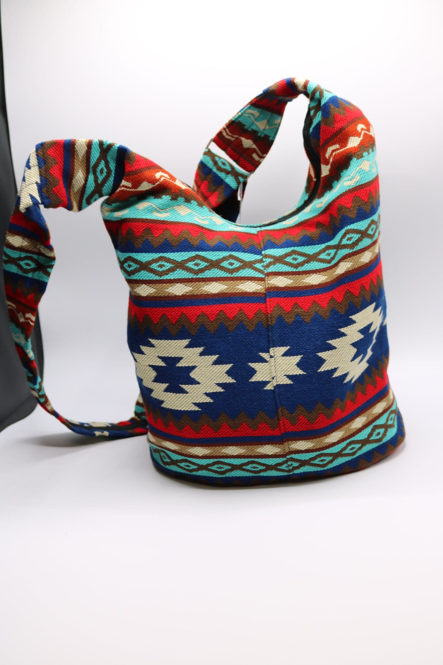 Bolso bandolera rojo y azul para botellas